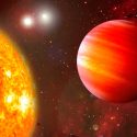 Un nuevo planeta rocoso se sofoca bajo tres soles rojos a 22 años luz